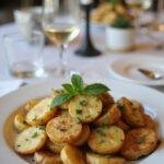 Elegant presentation of Pommes Sarladaises highlighting crispy potatoes, ideal for a fine dining experience.