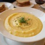 Delicious creamy purée de pommes de terre served as a side dish.